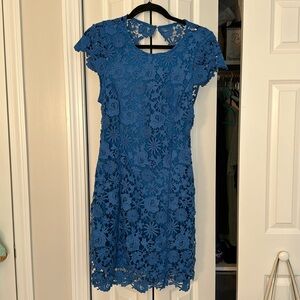 Lulu’s “Romance Language Blue Backless Lace Dress”